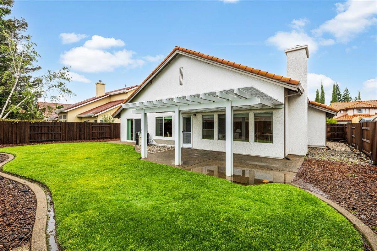 114 Kerwin Way Folsom, CA 95630 - Photo 26 of 29 a view of a house with backyard