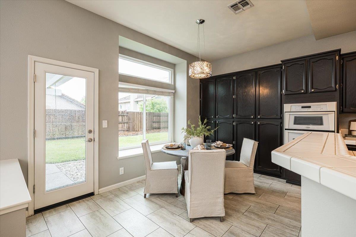 114 Kerwin Way Folsom, CA 95630 - Photo 9 of 29 a view of a dining room with furniture window and outside view