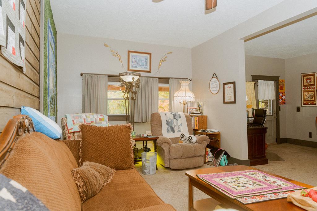 607 Main Street Emlenton, PA 16373 - Photo 14 of 62 a living room with furniture and a rug
