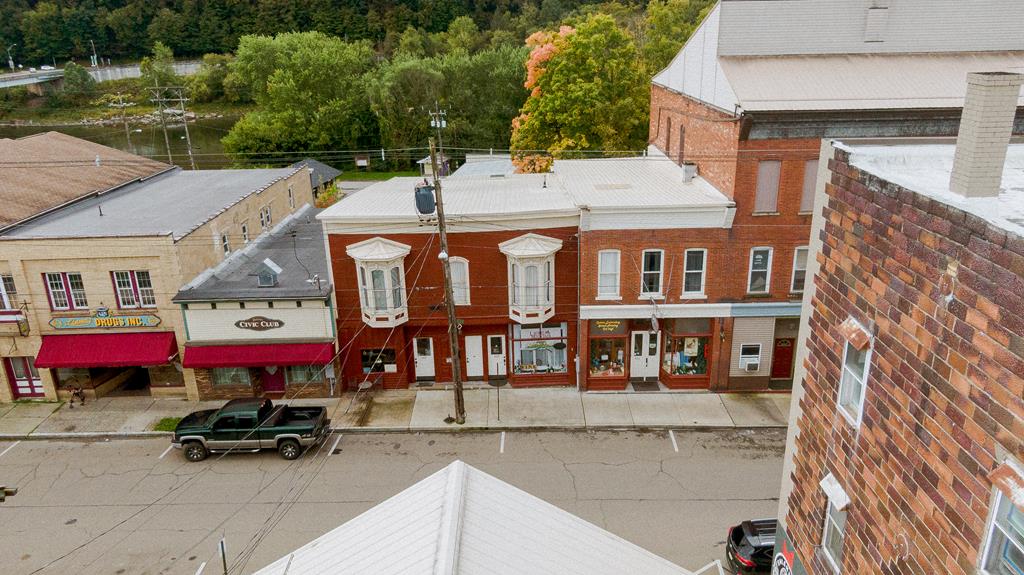 607 Main Street Emlenton, PA 16373 - Photo 2 of 62 a car parked in front of a building