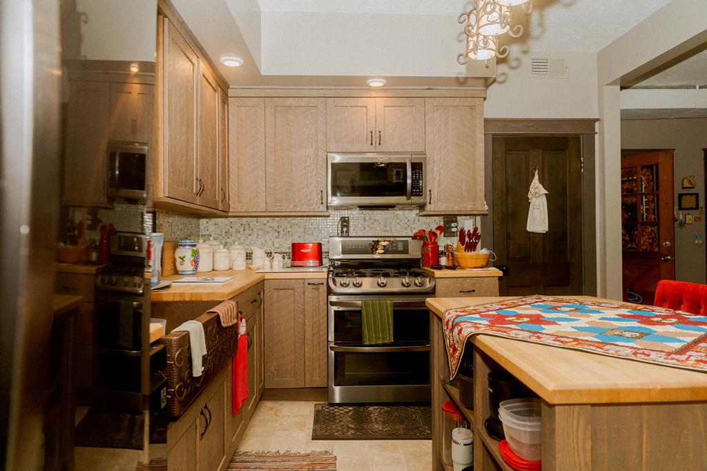 607 Main Street Emlenton, PA 16373 - Photo 21 of 62 a kitchen that has a lot of cabinets in it