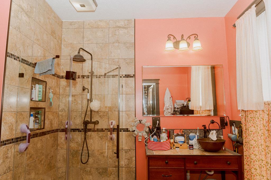 607 Main Street Emlenton, PA 16373 - Photo 25 of 62 a bathroom with a sink and mirror
