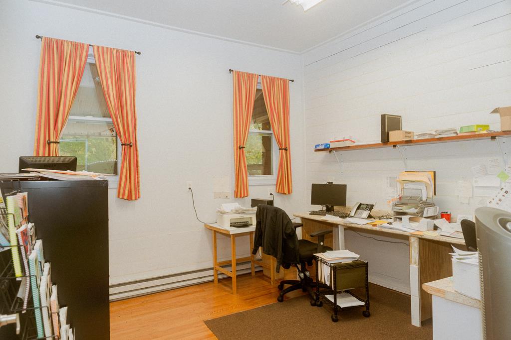 607 Main Street Emlenton, PA 16373 - Photo 34 of 62 a view of a workspace with furniture and a window