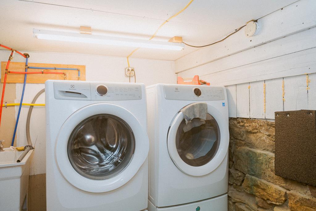 607 Main Street Emlenton, PA 16373 - Photo 40 of 62 a utility room with dryer and washer