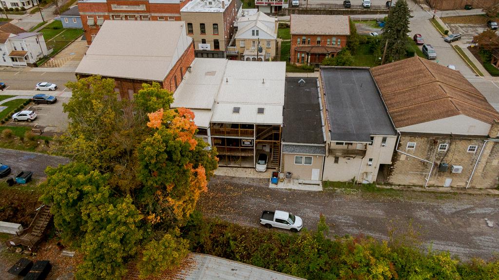 607 Main Street Emlenton, PA 16373 - Photo 9 of 62 an aerial view of a house with garden