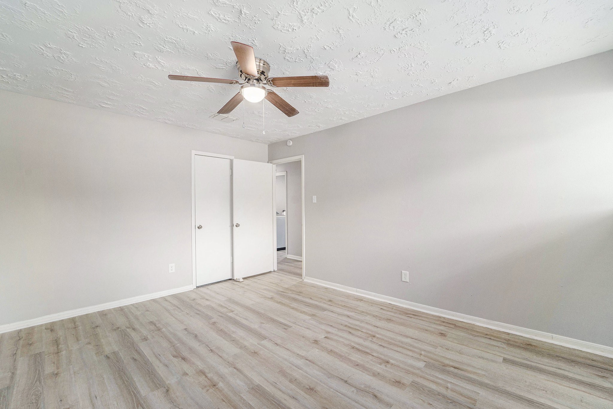 23235 Earlmist Drive Spring, TX 77373 - Photo 18 of 33 wooden floor in an empty room