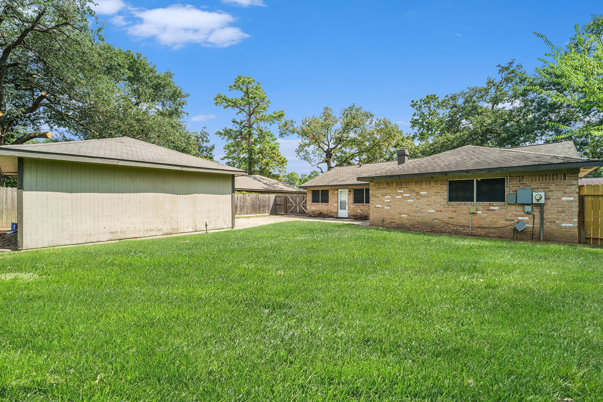 23235 Earlmist Drive Spring, TX 77373 - Photo 25 of 33 a front view of a house with a garden