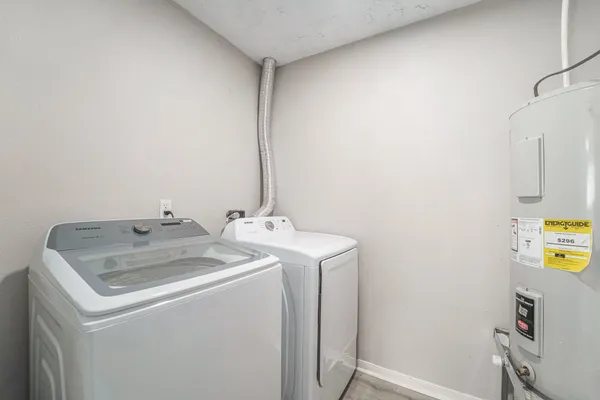 a utility room with dryer and washer