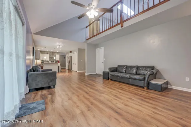 a kitchen with lots of counter top space and sink