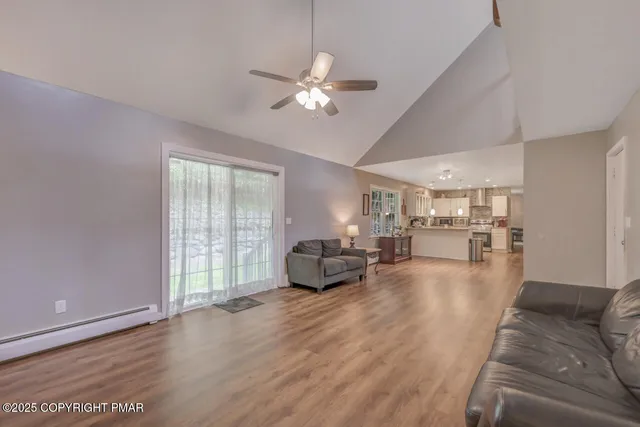 a kitchen with a refrigerator and a sink