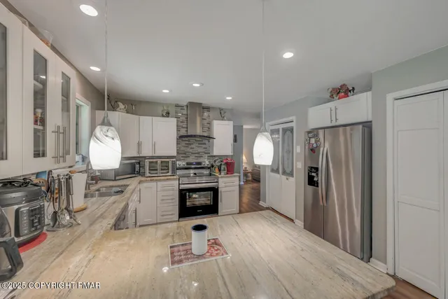 a bed room with a bed and a desk