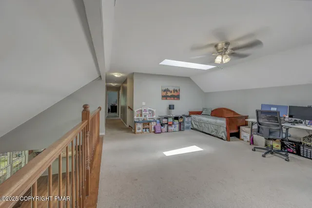 a bed room with a bed and a chandelier