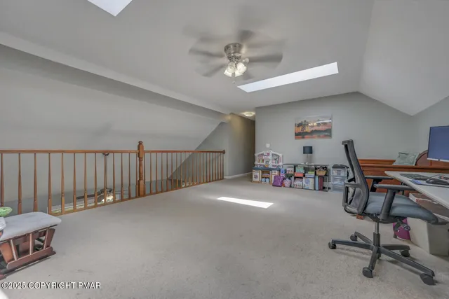 a bedroom with furniture and a chandelier