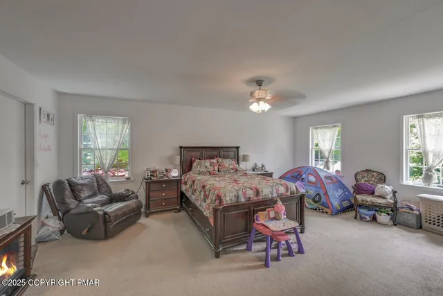 a bed room with a bed and furniture