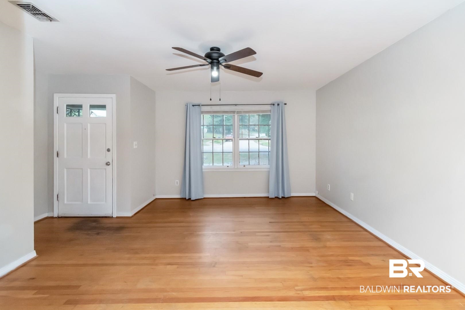 320 Vanderbilt Drive Mobile, AL 36608 - Photo 8 of 39 Spare room featuring ceiling fan and light hardwood / wood-style flooring
