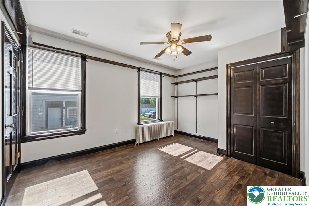 3453 Main Street Slatington, PA 18080 - Photo 17 of 30 Rich hardwood floors complement built-in shelving, ready for your personalized touch.