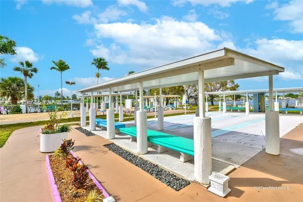 a view of a swimming pool with a patio