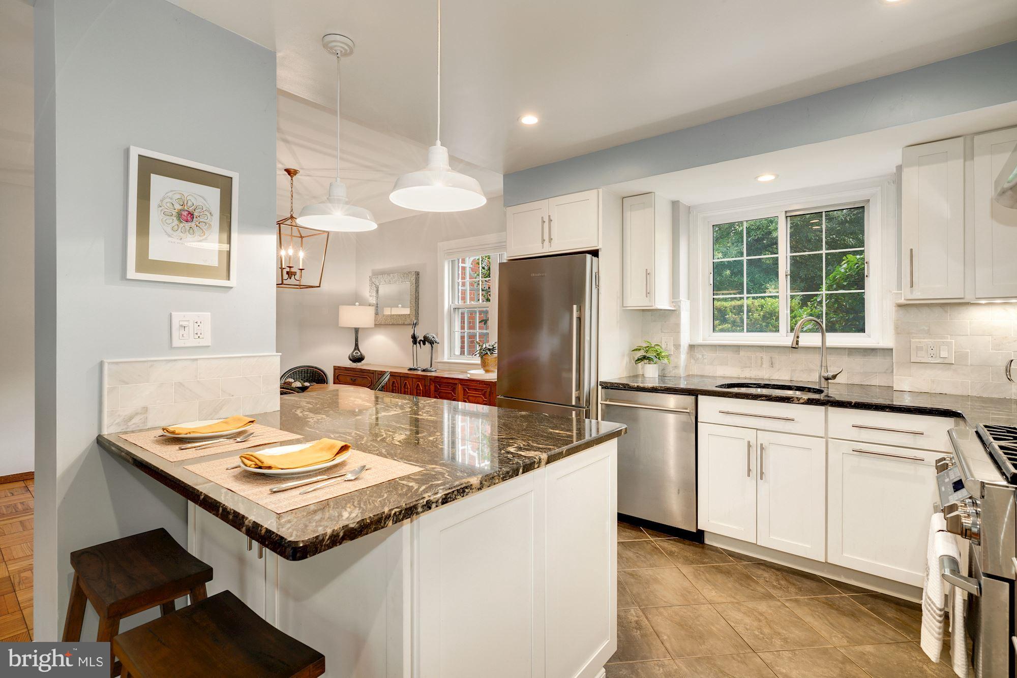 1806 Preston Road Alexandria, VA 22302 - Photo 3 of 42 Kitchen with breakfast bar, pendant lighting