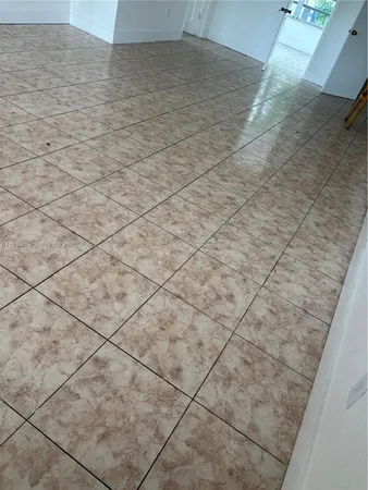 a bathroom with a toilet and shower