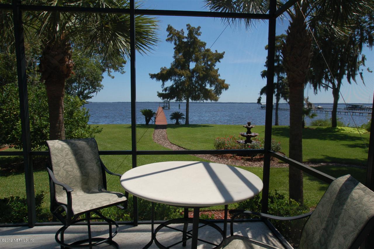4665 Raggedy Point Road Fleming Island, FL 32003 - Photo 26 of 85 a view of a chairs and table in patio
