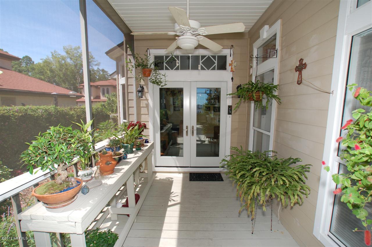 4665 Raggedy Point Road Fleming Island, FL 32003 - Photo 38 of 85 a view of a house with potted plants