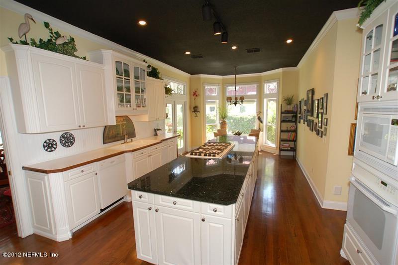 4665 Raggedy Point Road Fleming Island, FL 32003 - Photo 4 of 85 Kitchen w/Breakfast Bar and much more
