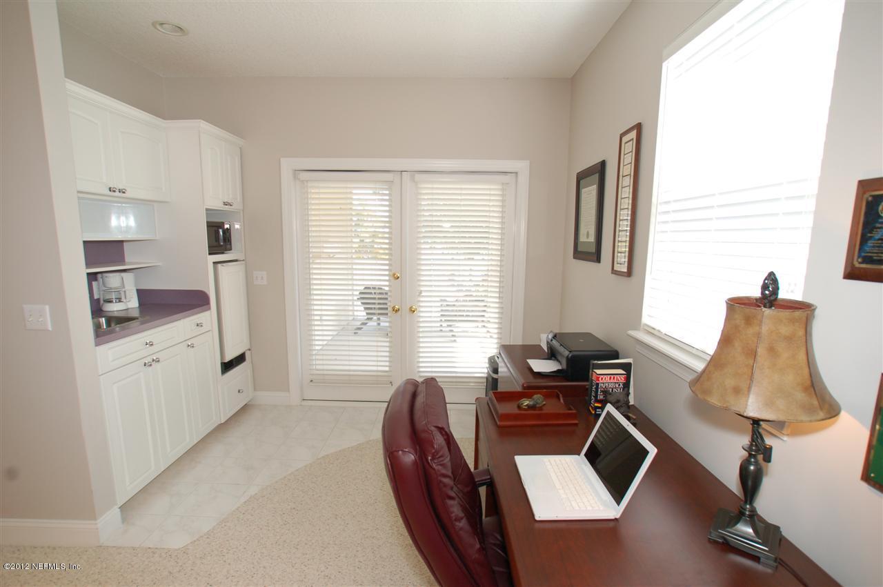 4665 Raggedy Point Road Fleming Island, FL 32003 - Photo 48 of 85 a dining room with furniture and window