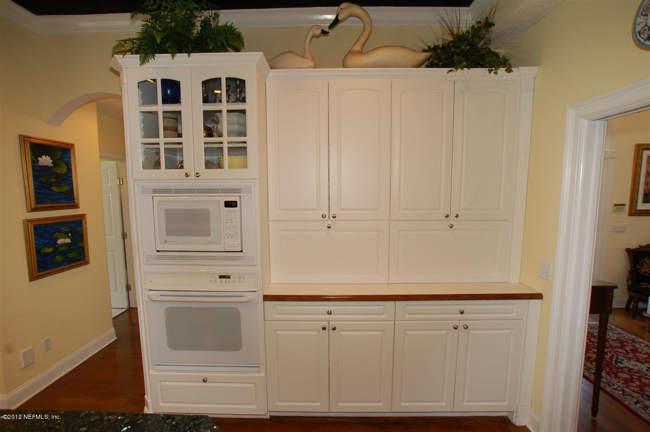 4665 Raggedy Point Road Fleming Island, FL 32003 - Photo 5 of 85 a view of cabinets