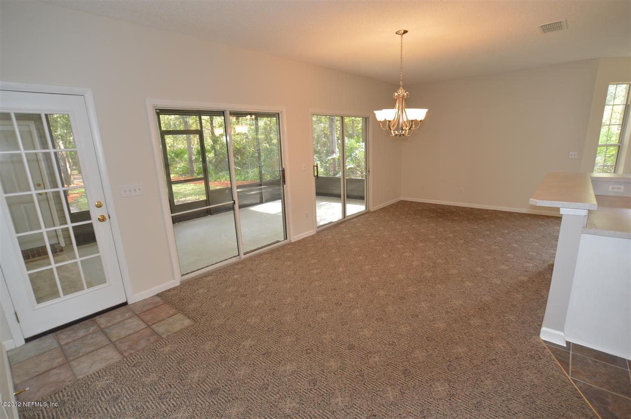 4665 Raggedy Point Road Fleming Island, FL 32003 - Photo 66 of 85 a view of an empty room with a window