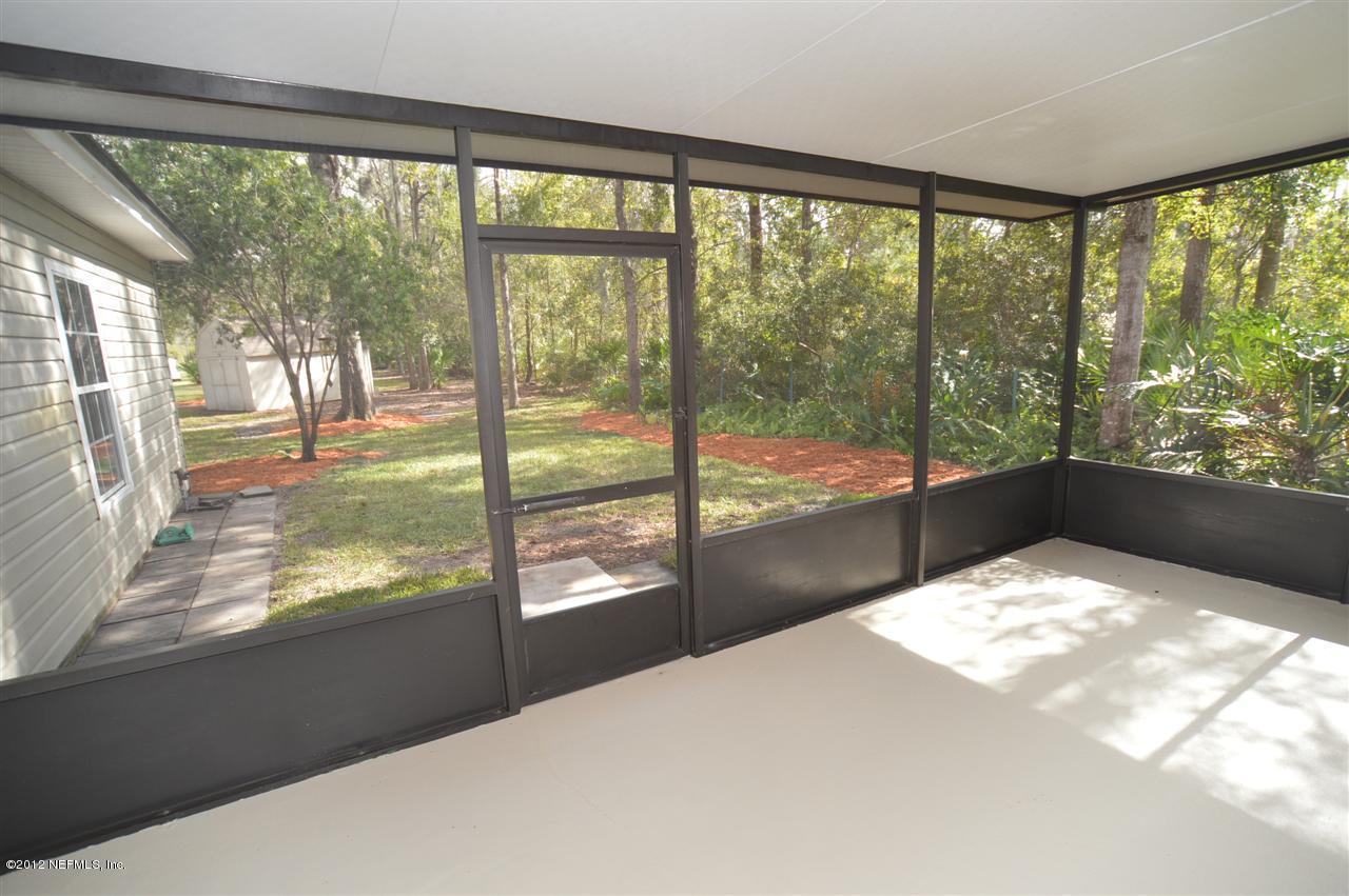 4665 Raggedy Point Road Fleming Island, FL 32003 - Photo 78 of 85 Smaller Home Lanai to Yard View