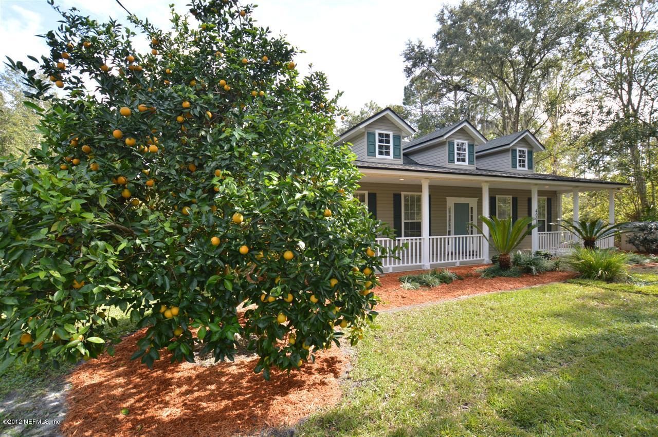 4665 Raggedy Point Road Fleming Island, FL 32003 - Photo 84 of 85 a view of a house with a yard