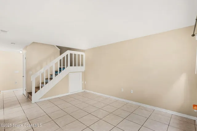 a view of an entryway with stairs