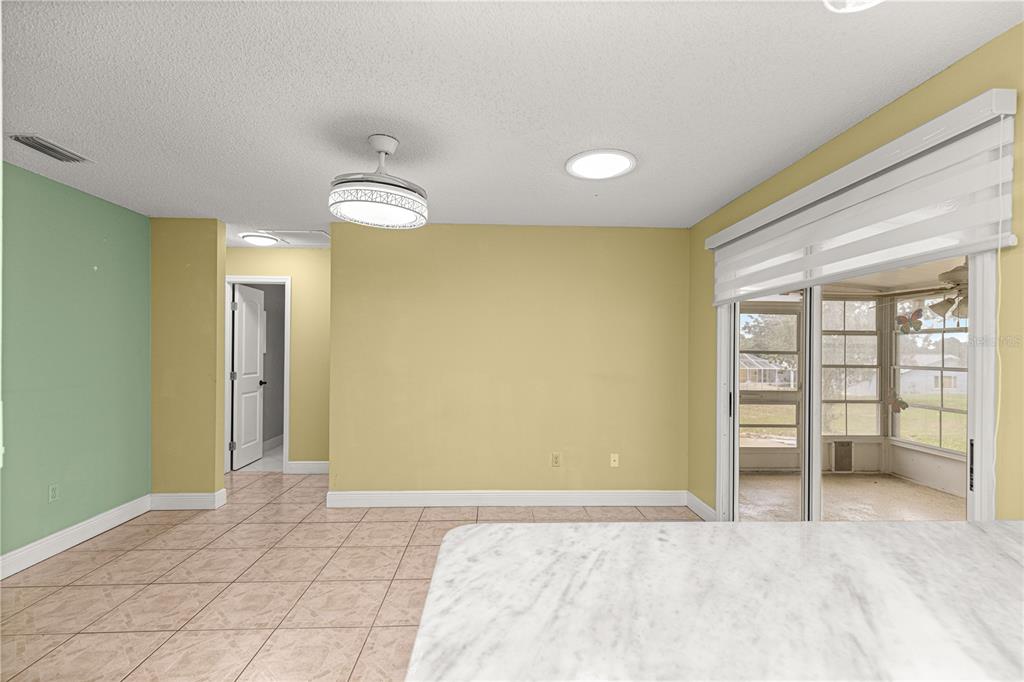 8470 Southwest 107th Place Ocala, FL 34481 - Photo 14 of 44 a view of an empty room with a window
