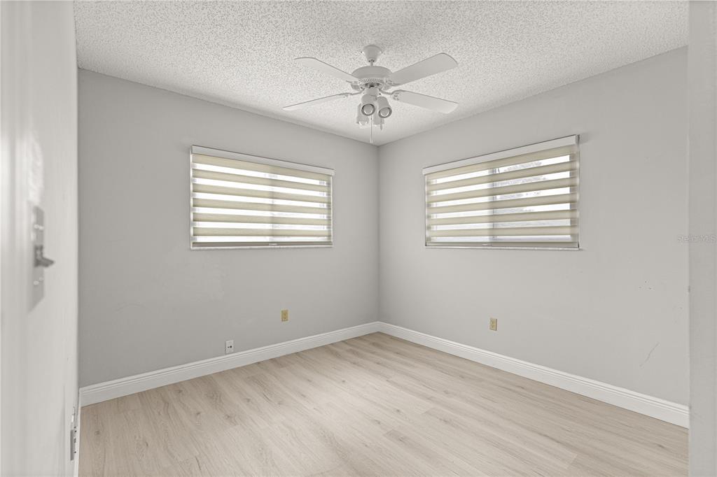 8470 Southwest 107th Place Ocala, FL 34481 - Photo 23 of 44 an empty room with a window