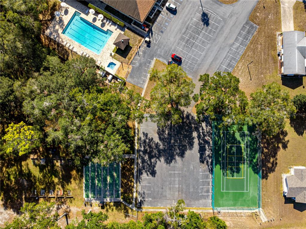 8470 Southwest 107th Place Ocala, FL 34481 - Photo 32 of 44 an aerial view of a house with a yard and garden