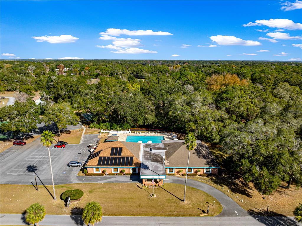 8470 Southwest 107th Place Ocala, FL 34481 - Photo 39 of 44 an aerial view of a house with a swimming pool