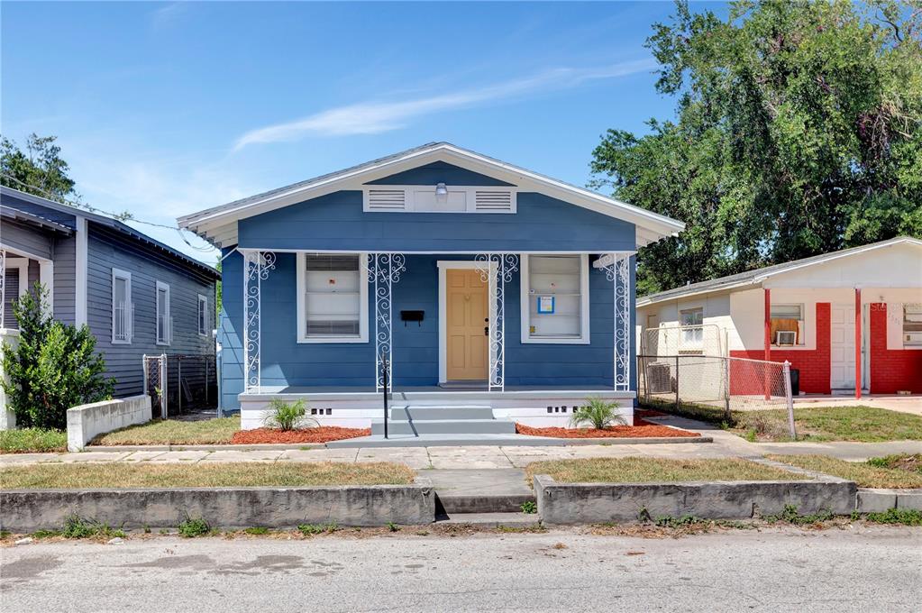 2523 West Spruce Street Tampa, FL 33607 - Photo 1 of 1 a view of a house with a yard