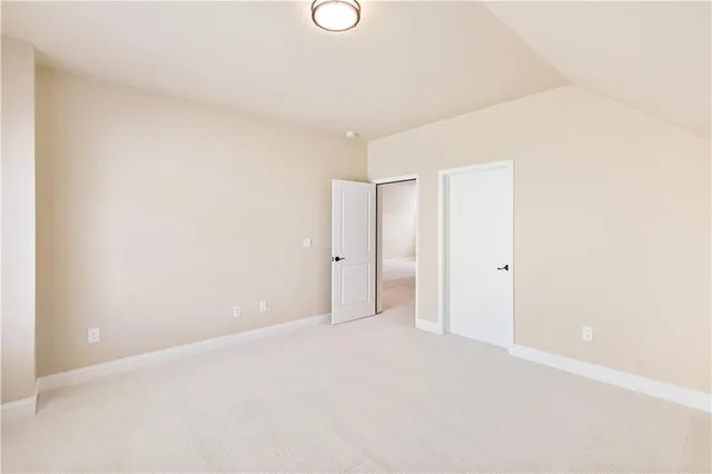 a view of a house with backyard and porch