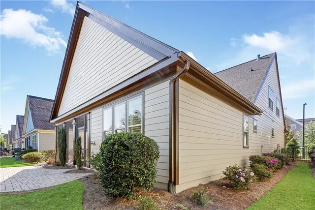 swimming pool view with a seating space