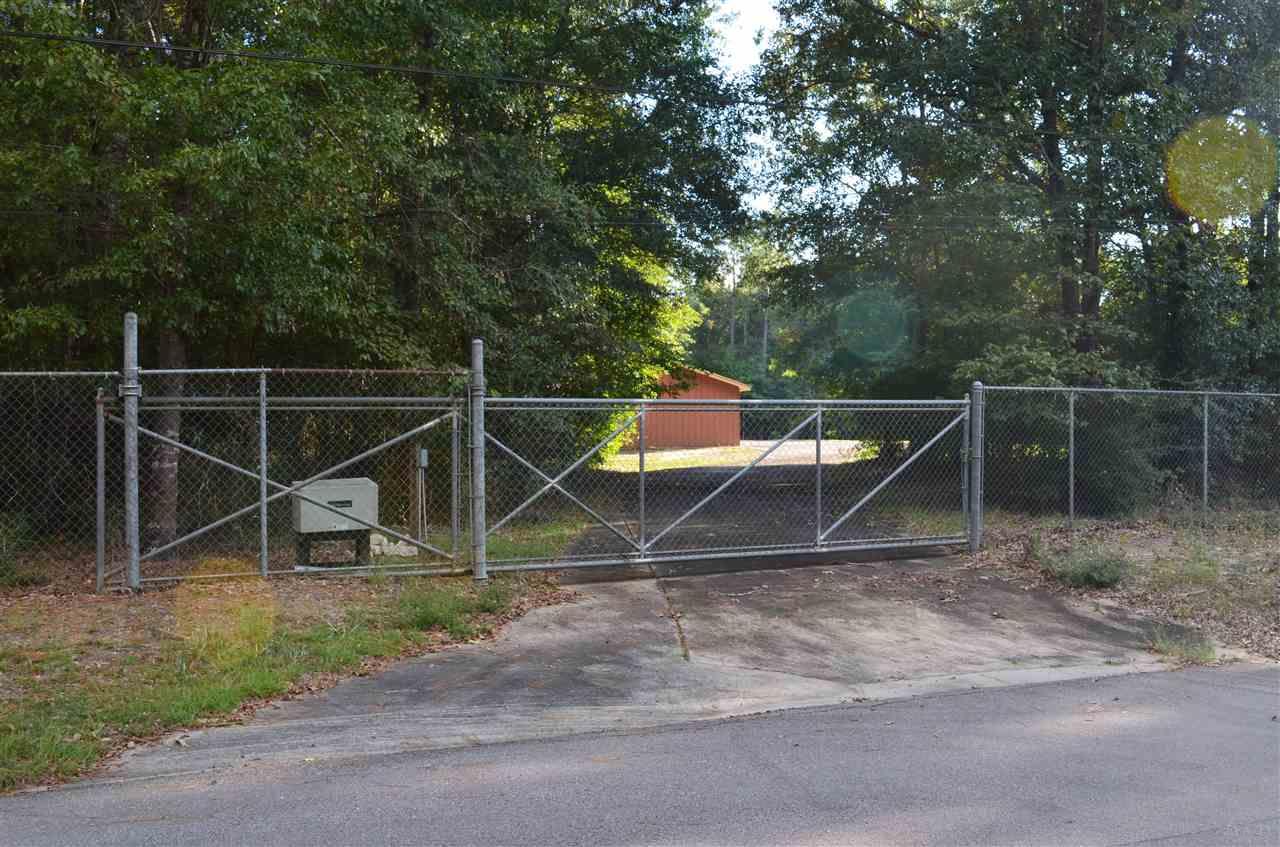 6085 Last Chance Road Milton, FL 32570 - Photo 2 of 21 Entry gate on Last Chance Rd
