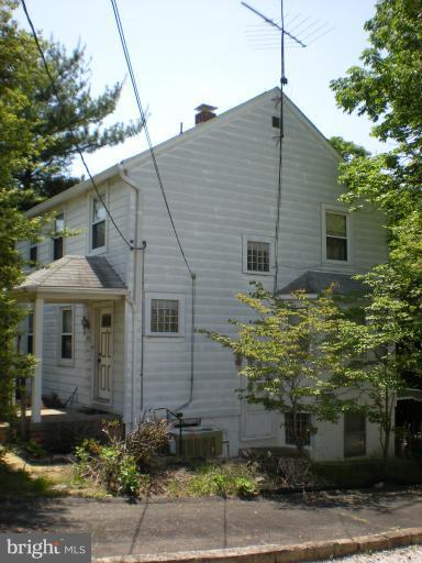 1233 Greystone Road Halethorpe, MD 21227 - Photo 11 of 30 a front view of a house with plants