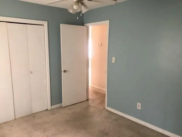 an empty room with a hallway