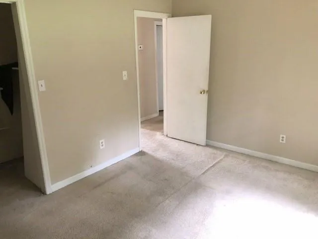 an empty room with closet