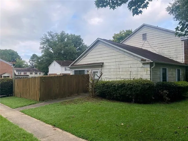 a view of a house with a garden
