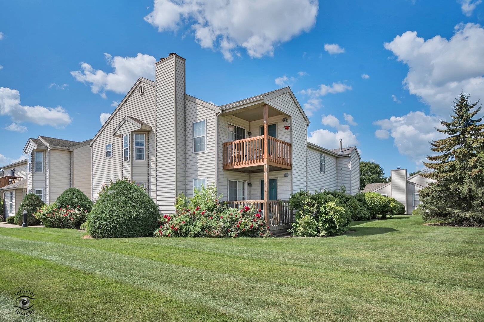 608 Huntington Court, Unit 608 Bourbonnais, IL 60914 - Photo 1 of 27 a front view of a house with garden