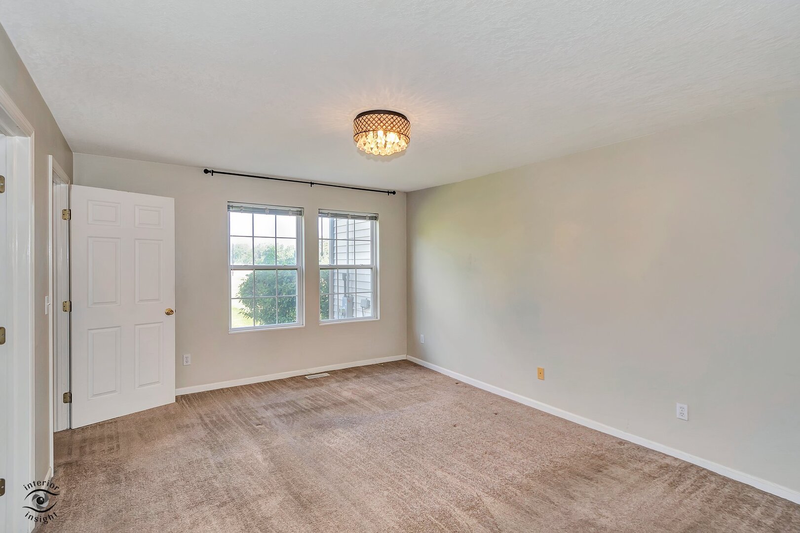 608 Huntington Court, Unit 608 Bourbonnais, IL 60914 - Photo 16 of 27 a view of an empty room with a window