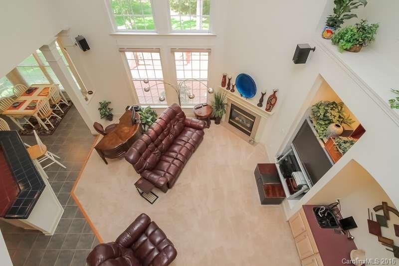 10622 Back Ridge Road Charlotte, NC 28277 - Photo 12 of 24 a living room with furniture and a large window