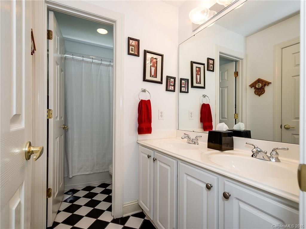 10622 Back Ridge Road Charlotte, NC 28277 - Photo 17 of 24 a bathroom with a sink and a mirror