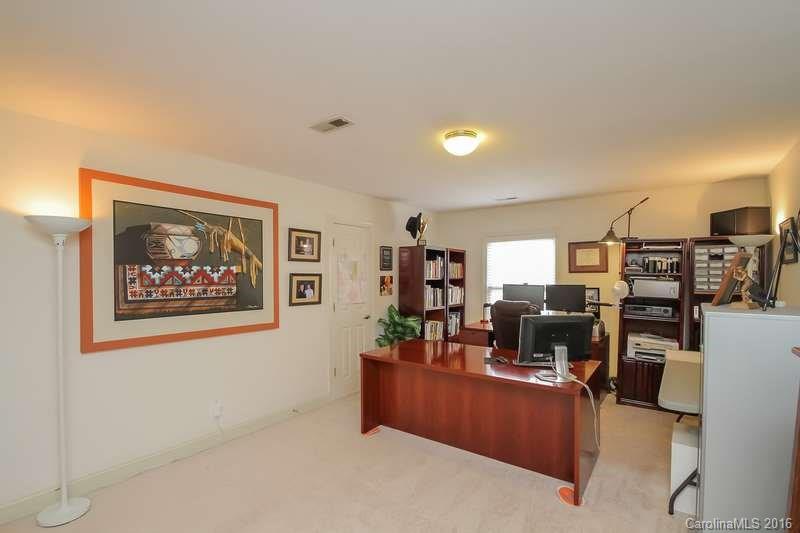 10622 Back Ridge Road Charlotte, NC 28277 - Photo 18 of 24 a living room with furniture and a view of kitchen