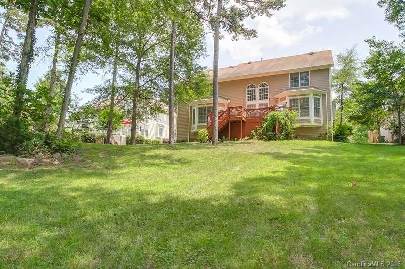 10622 Back Ridge Road Charlotte, NC 28277 - Photo 21 of 24 a front view of house with yard and green space